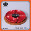 round ceramic dish set with wooden base